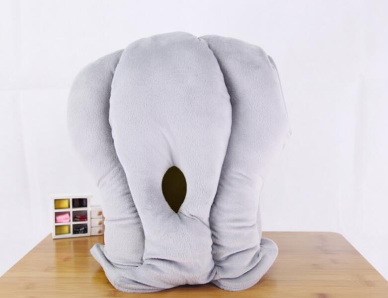 Almohada de viaje creativa portátil.